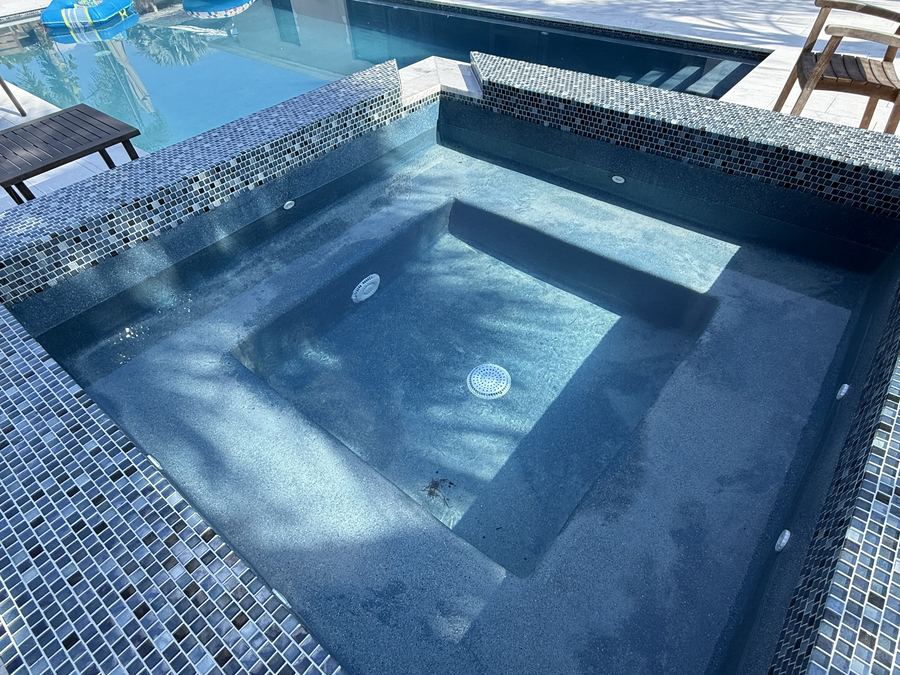Spa interior with glass tile and built in seating